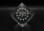 Crystal block with 'Freedom 250' engraving on a black background