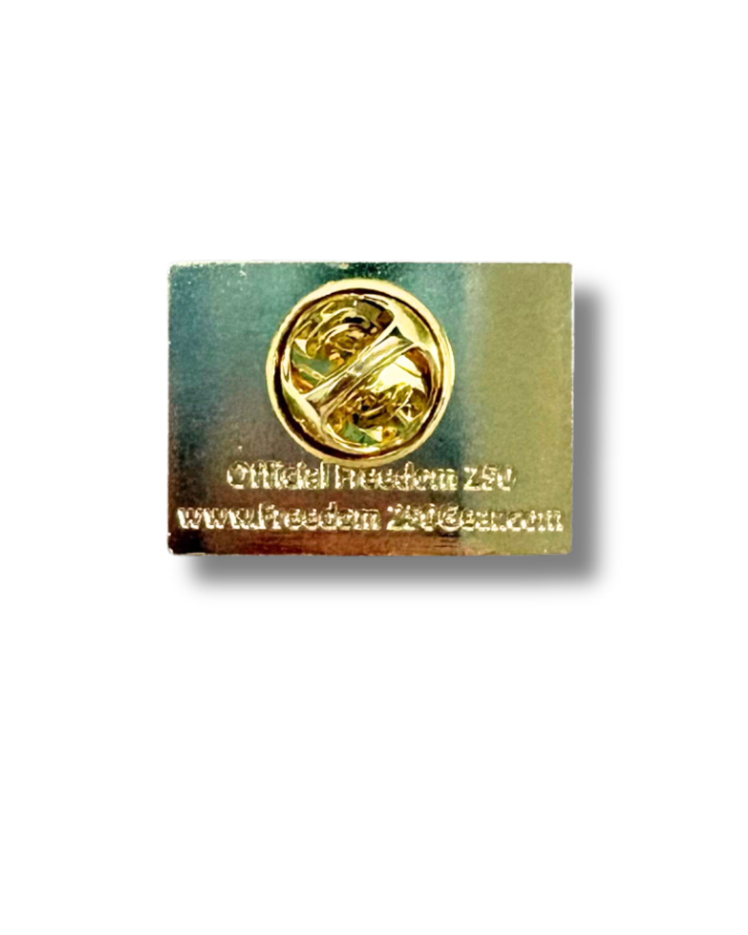 Gold pin on a green card with text