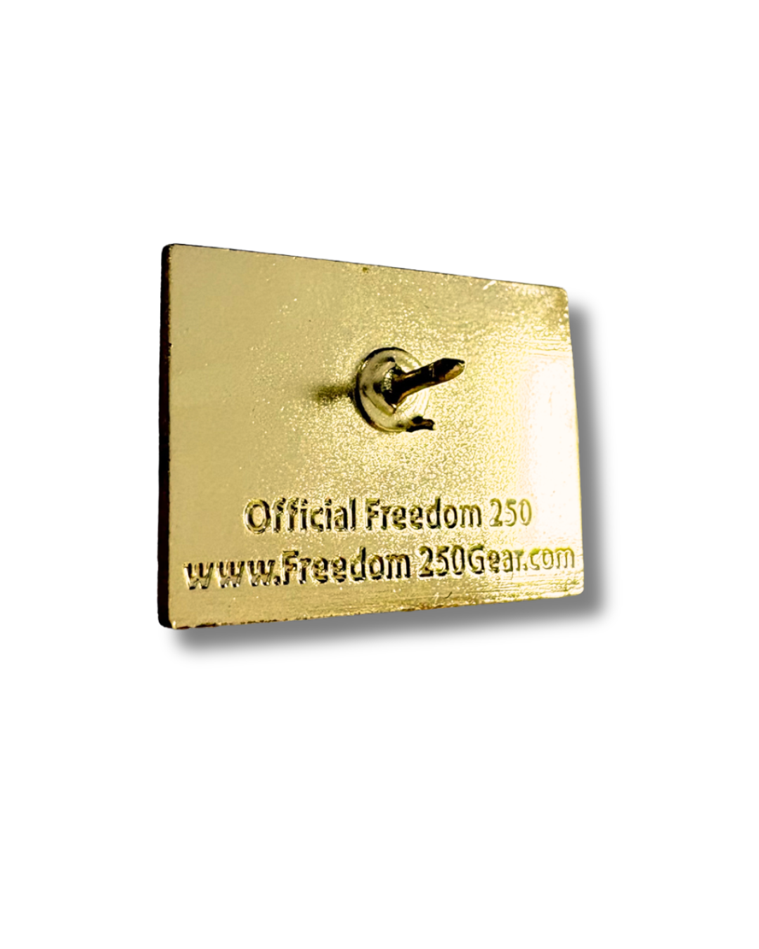 Gold pin with 'Official Freedom 250' text on a white background