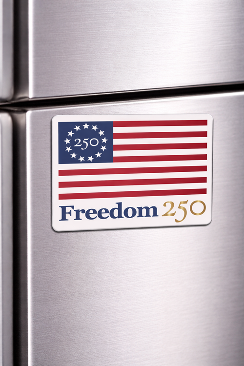 Sticker on a refrigerator with 'Freedom 250' text and design