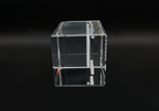 Clear acrylic cube on a black background