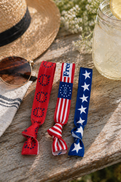 Freedom 250 ponytail ribbon kept on desk